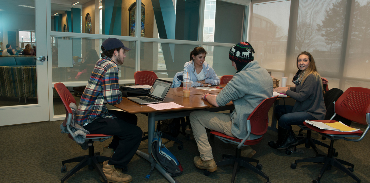 students collaborating in private study room; SCSU Hilton C. Buley Library