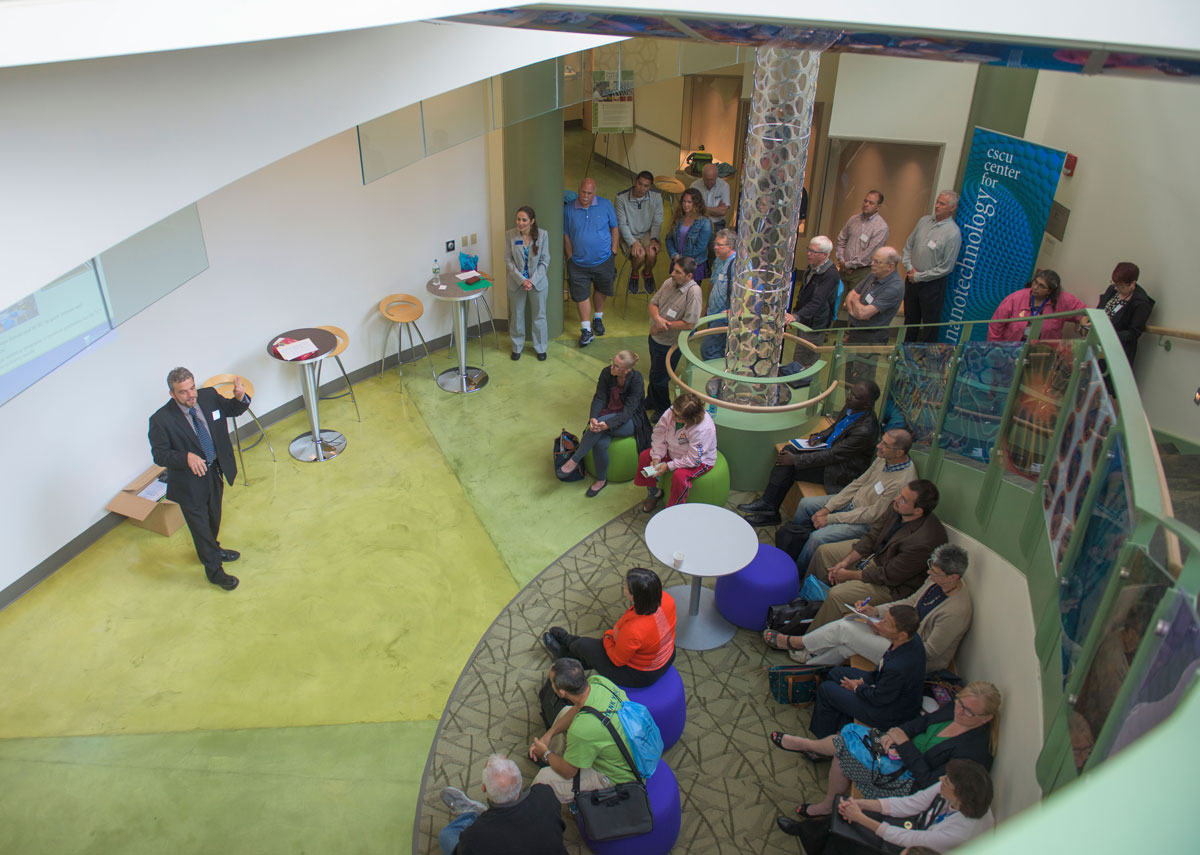 Faculty listening to presentation at Southern's science center