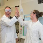 Assistant Professor James Kearns in chemstry lab with chemistry major Cody Edson