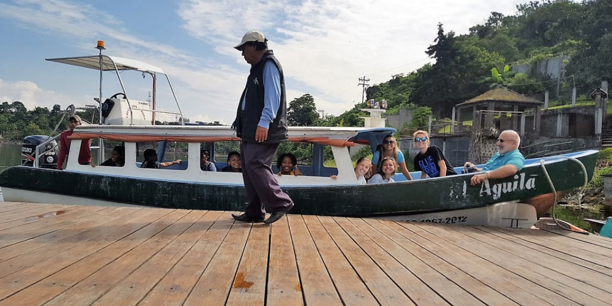 Dr. William Faraclas and his students prepare to cross Lake Atitlán to visit a comadrona—a traditional birth attendant—in San Juan La Laguna.