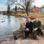 SCSU alumni Laura Macaluso, ’94, and Jeffrey Nichols, ’96, sitting on steps in Boiling Springs, Penn.