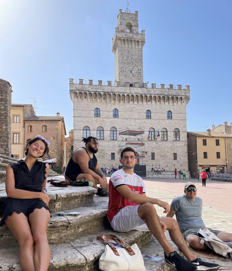 Students beat the Italian heat in the Piazza Grande in Montepulciano. 