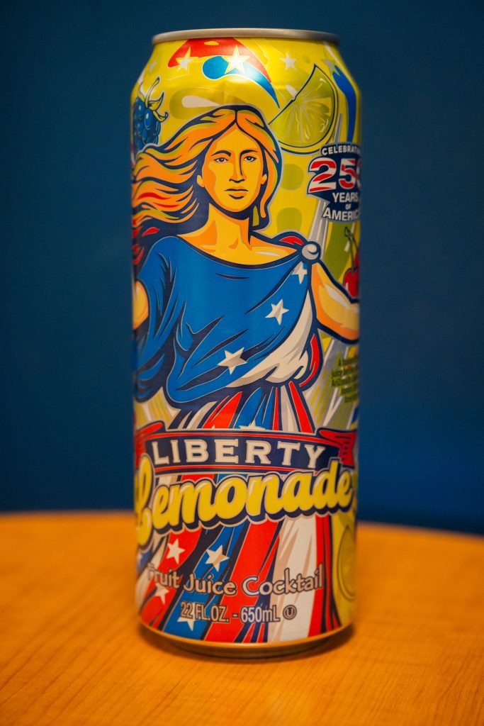 A 250th anniversary edition can of Arizona Liberty Lemonade with graphic of woman dressed in red, white, and blue