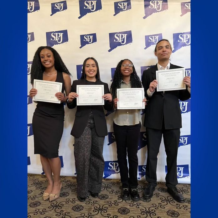 Four Southern Connecticut State University journalism students stand in front of a Connecticut Society of Professional Journalists (SPJ) backdrop holding Excellence in Journalism Award certificates. Pictured from left to right are Brianna Wallen, Valentina Toro, Solè Scott, and Brandon Cortés. The students earned honors in the 2026 Connecticut SPJ Excellence in Journalism Awards for reporting projects produced through Southern’s journalism program and the Connecticut Student Journalism Collaborative.